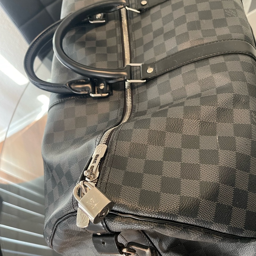 Damier Graphite Canvas, Keepall Bandoulière 55, 21.7 x 12.2 x 9.4 inches - Picture 2 of 3